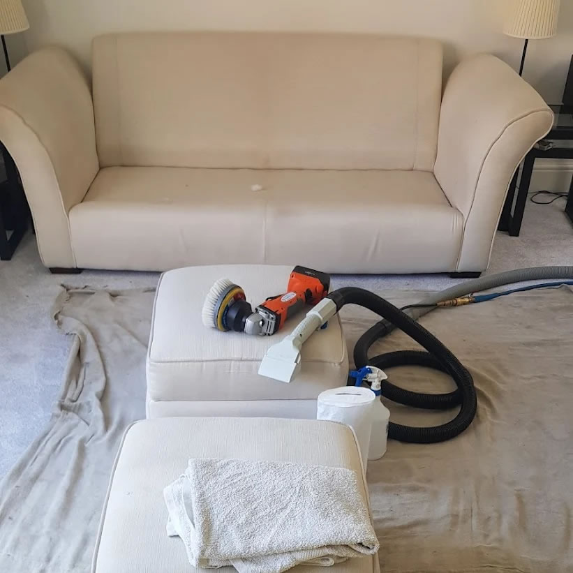 Upholstery cleaning - small sofa and cleaning equipment